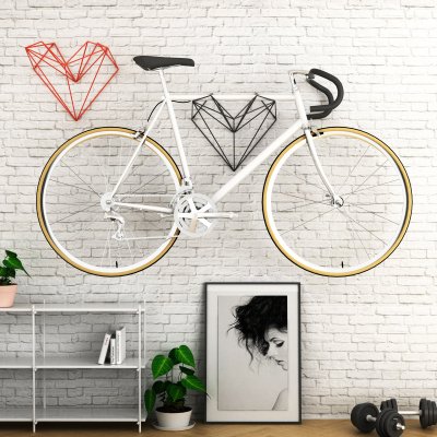Držák na kolo ve tvaru srdce je určen převážně pro městská kola. Spojuje design a praktické vlastnosti. (Zdroj : www.designbuy.cz)