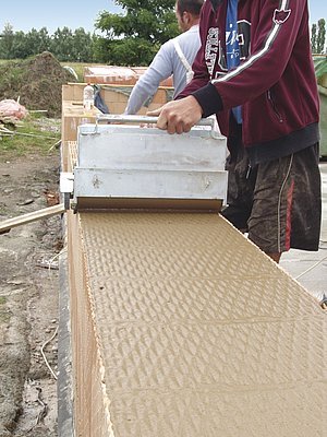 Nanášení celoplošné tenkovrstvé malty HELUZ