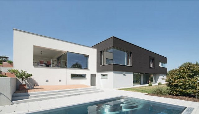 Rovné, hranaté linie a moderní design dotváří architekturu domu