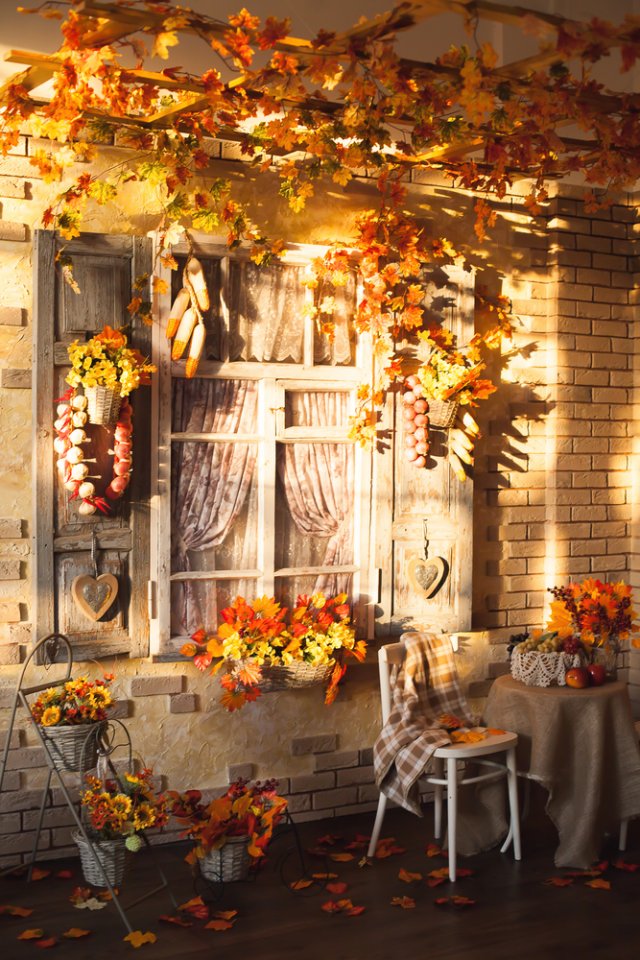 Nezapomeňte do podzimních tónů vyladit i prostor u vchodových dveří a terasu. Foto: Favore Studio