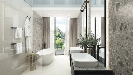 Luxusní koupelny disponují velkoformátovými obklady. Vany a umyvadla jsou v minimalistickém designu.